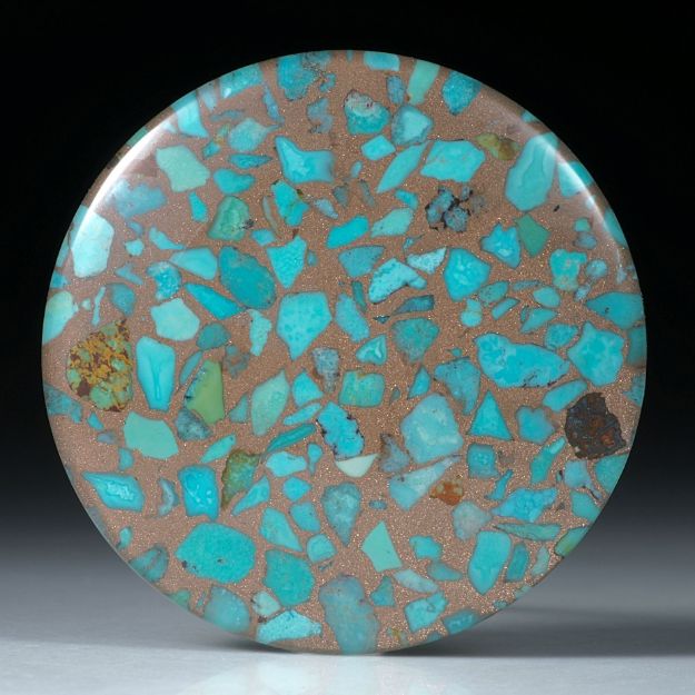 Türkis in Bronzematrix, mit Bergkristall doublettiert, runder Cabochon