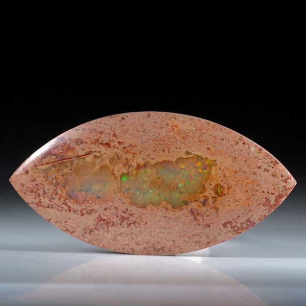 Feueropal Navette, leicht bombiert ca.55x27.5x7mm