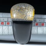 Fingerring Goldglas und Silberglas, bombierte Form im Verlauf geschliffen und poliert