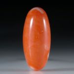 Edelkoralle, ovaler Cabochon ca.31x13.5x8.5mm, 29.33ct.