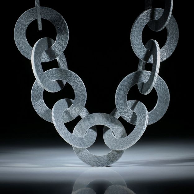Alutex Scheibencollier, 25 Teile mit Aussendurchmesser 33mm und Bohrung 19mm, Länge total 47cm