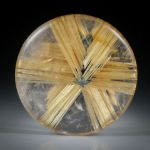 Rutilstern 33.91ct. runder Cabochon, beidseitig bombiert geschliffen und poliert, ca.26.5x26.5x6mm