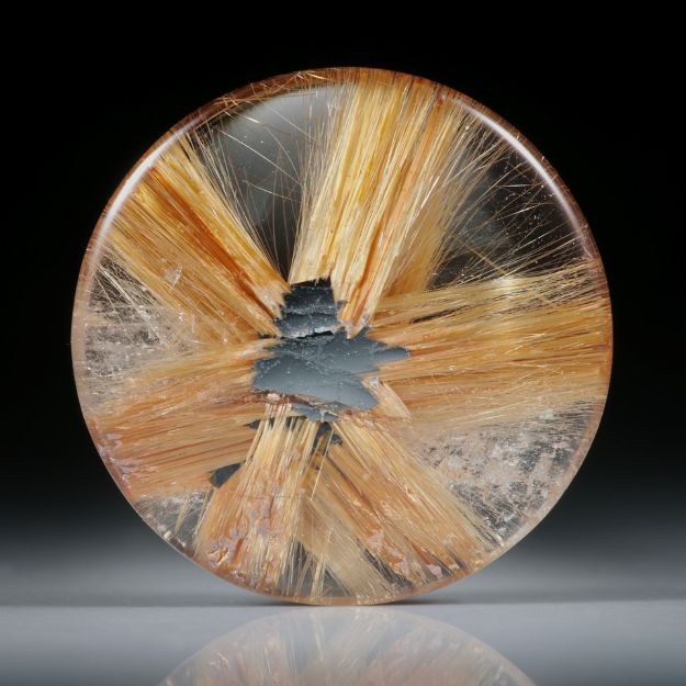 Sternrutil 16.96ct. runder Cabochon, beidseitig bombiert geschliffen und poliert, ca.22x22x5mm