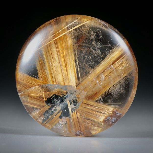 Rutilstern 23.97ct. runder Cabochon, beidseitig bombiert geschliffen und poliert, ca.21.5x21.5x7mm