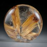Rutilstern 23.97ct. runder Cabochon, beidseitig bombiert geschliffen und poliert, ca.21.5x21.5x7mm