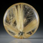Rutilstern 23.77ct. runder Cabochon, beidseitig bombiert geschliffen und poliert, ca.22x22x7mm