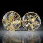 Rutilstern Paar, 21.52ct. runde Cabochon, beidseitig bombiert geschliffen und poliert, je ca.17x17x5.5mm