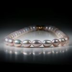 Perlencollier Süsswasser, rosa oval, Durchmesser 8.5 - 9mm, Gesamtlänge 44cm, geknüpft, mit vergoldetem Silberverschluss