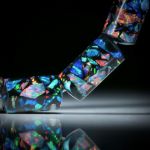 Edelsteincollier Synthetischer Opal in Epoxymatrix schwarz, polierte Zylinderformen, Durchmesser 10mm, Länge ca.46cm