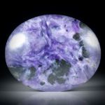 Charoit (Tscharoit), grosser ovaler Cabochon ca.50x40x7.5mm