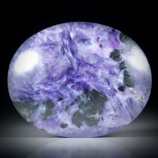 Charoit (Tscharoit), grosser ovaler Cabochon ca.50x40x7.5mm