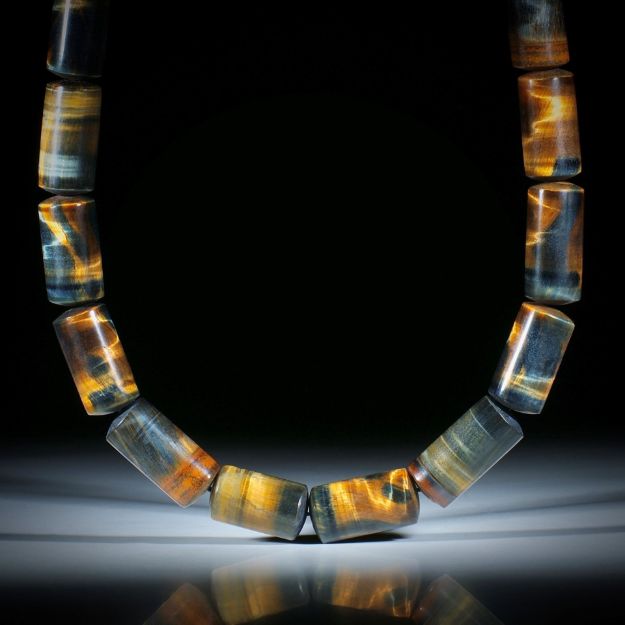 Edelsteincollier Tiger- / Falkenauge, polierte Zylinderformen mit bombierten Seiten, Durchmesser 12mm, Länge ca.46cm