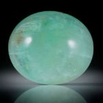 Smaragd Cabochon 66.08ct. oval bombiert ca.29.5x25.5x13.5mm
