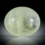 Goldberyll Cabochon 53.41ct.  mit leichtem Katzenaugen Effekt, ovale Form bombiert ca.28x24x13mm