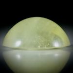 Goldberyll Cabochon 53.41ct.  mit leichtem Katzenaugen Effekt, ovale Form bombiert ca.28x24x13mm