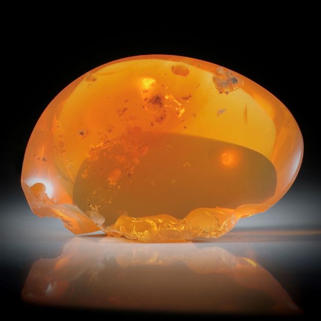Feueropal Freiform, teilweise naturbelassen ca.51x38x19.5mm