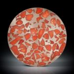 Edelkoralle corallium rubrum, in Bronzematrix, Paar 73.26ct. Rondellen plangeschliffen und poliert, je ca.35x35x2.3mm
