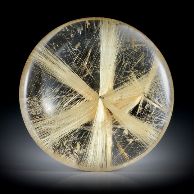 Rutilstern 38.87ct. runder Cabochon, beidseitig bombiert geschliffen und poliert, ca.27x27x7mm