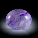 Sugilith 33.67ct. Cabochon oval, ca.28x23x8mm