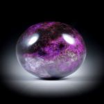 Sugilith 51.55ct. Cabochon oval, ca.27x22x11mm