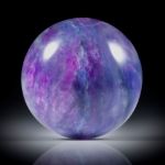 Sugilith 39.32ct.  runder Cabochon ca.24x24x9mm