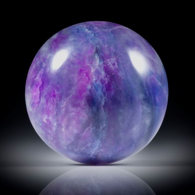 Sugilith 39.32ct.  runder Cabochon ca.24x24x9mm