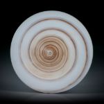 Conus figulinus, runde Scheibe, konkav zur Spitze geschliffen und poliert, Durchmesser 35mm