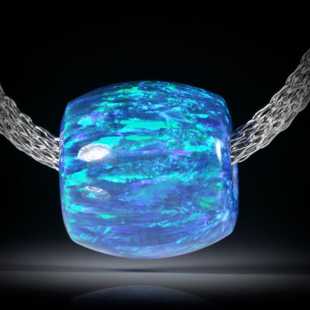 Anhänger aus synthetischem Opal, Fassform poliert, Aussendurchmesser 18mm, Bohrung 6mm, Länge 17mm