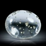 Quarz Cabochon mit Pyrit Einschlüssen 19.39ct. ca.19.8x16x8.9mm