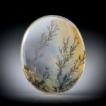 Quarz mit Dendriten Einschlüssen 23.44ct. oval ca.27x21.8x5.7mm