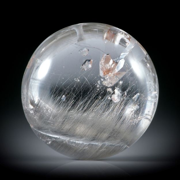 Quarz aus Brasilien 39.09ct. mit eingewachsenen Quarzkristallen und Rutilnadeln, rund ca.23.5x23.5x11mm