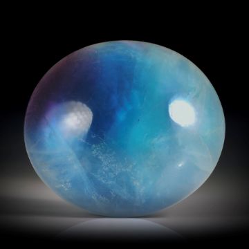Fluorit Cabochon ca.33x29x11mm, ovale Form, mit Perlmutter hinterlegt
