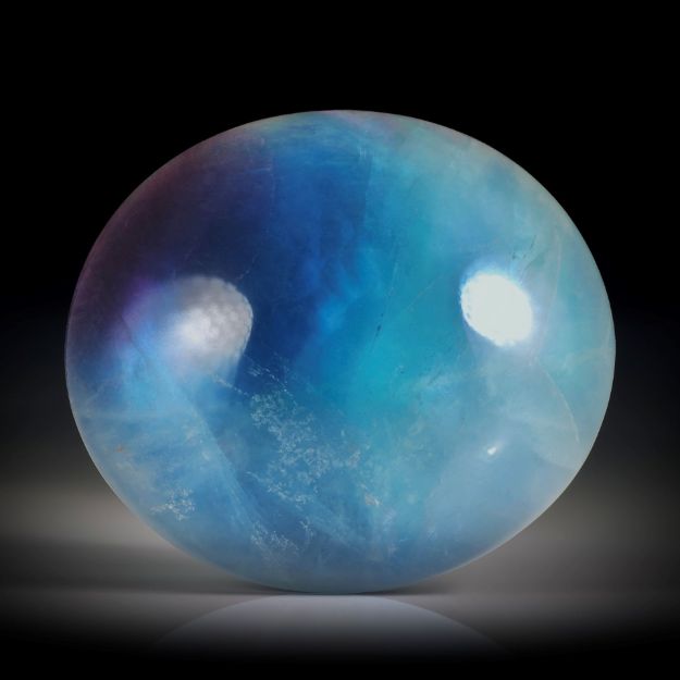 Fluorit Cabochon ca.33x29x11mm, ovale Form, mit Perlmutter hinterlegt